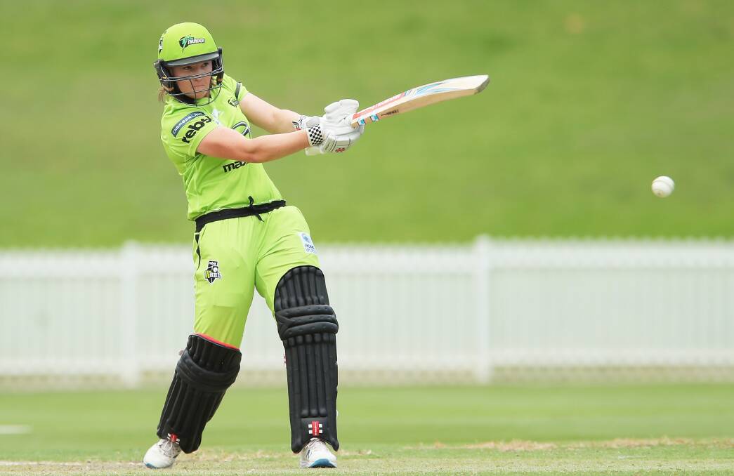IN FORM: Rachel Trenman blasts a shot
during her innings of 38 for Sydney Thunder
against Adelaide on Saturday. Picture: Getty Images 