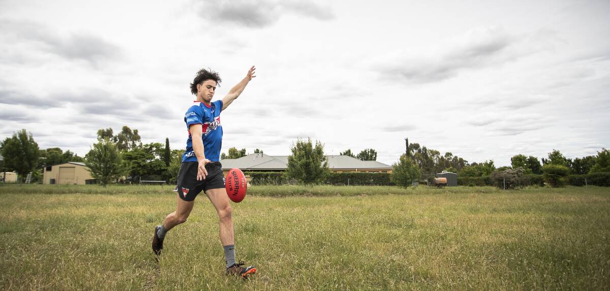 AFL Draft hopeful Pat Voss gets in some practice at the family's Springvale home on Tuesday. Picture: Ashley Smith