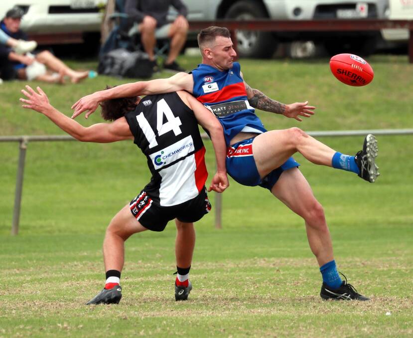 SOLID HITOUT: Turvey Park's Josh Ashcroft gets a kick away under pressure during Saturday's trial match against North Wagga. Picture: Les Smith