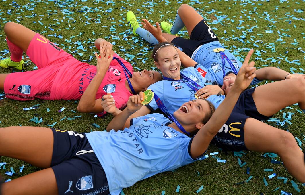 WAGGA BOUND: Sydney FC W-League players celebrate after winning the grand final in February. Picture: AAP Image/Dan Himbrechts