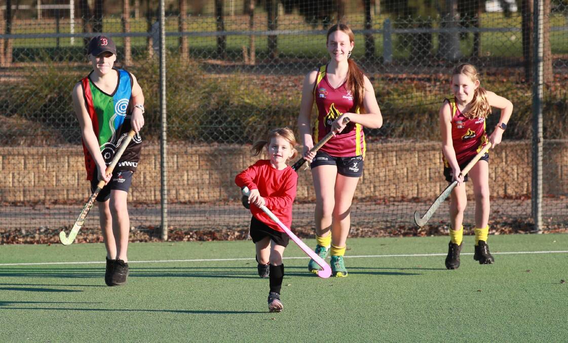 JUNIOR HOCKEY RETURNS: Axel Knowles, 13, Alexis Bailey, 13, Milla Bailey, 11 and Payten Knowles, five at Jubilee Park earlier this year. Picture: Les Smith