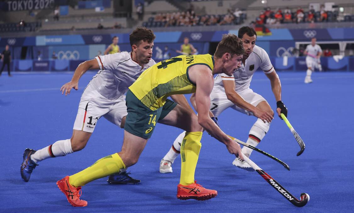 GUARANTEED MEDAL: Wagga's Dylan Martin during Australia's semi final win over Germany. The Kookbaurras take on Belgium in Thursday night's Olympic final. Picture: AAP Images