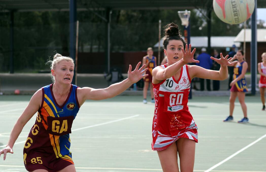 STILL TOP: Collingullie-Glenfield Park's Paige Guthrie (right) tries to beat Ganmain-Grong- Grong-Matong's Olivia Hounsell to a ball during her team's win on Saturday. 