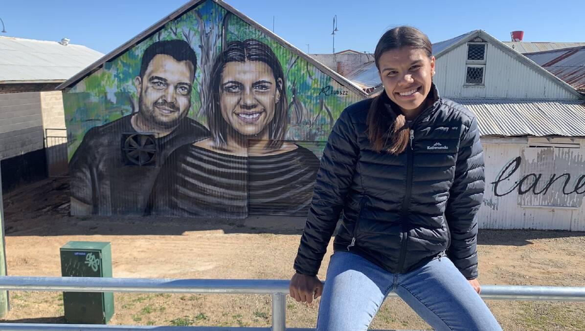 NEW SEASON: Wagga product Jada Whyman, pictured with a mural of herself
and comedian Dane Simpson in town, has hailed the Matildas' equal pay deal.
Picture: Twitter/Jada Whyman