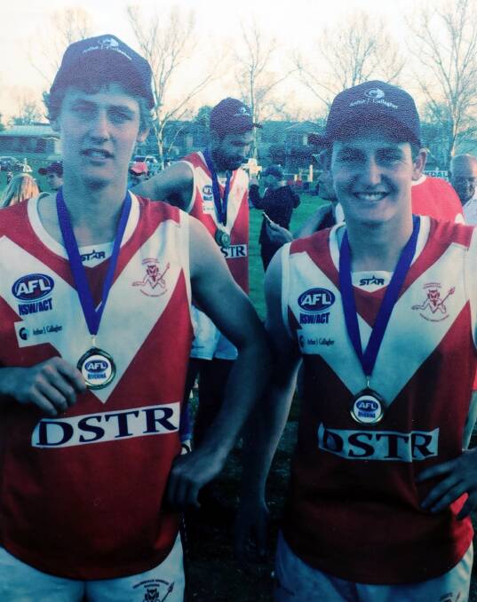 Harry Perryman (left) with older brother Nick after a Collingullie-Glenfield Park premiership. 