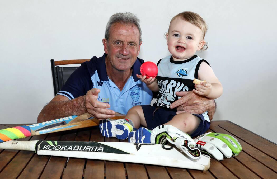 GENERATIONS: Ted Ryder Sports Memorial Award winner Brian Robinson with grandson Dusty Callan, 15 months. Picture: Les Smith