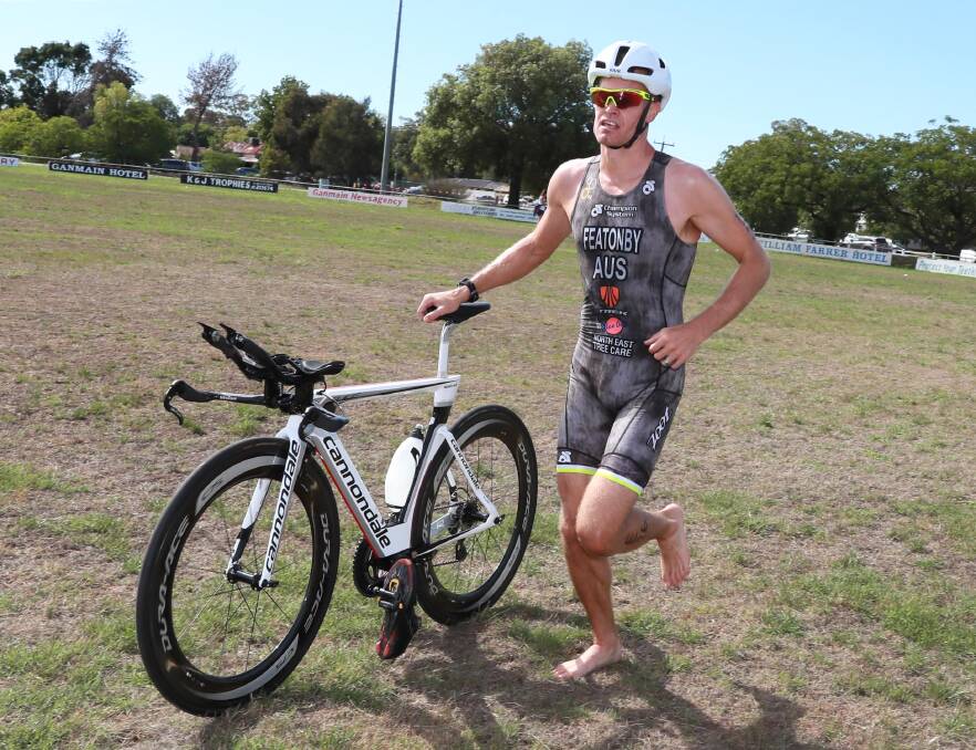 MAN TO BEAT: Albury's Jesse Featonby in action during his win at the Ganmain Triathlon last year. Picture: Les Smith