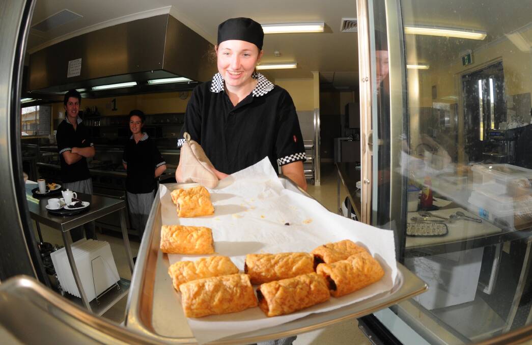SCHOOL DAYS: Rebecca Miller bakes some sausage rolls during her schooling at Mater Dei in 2012. Picture: Michael Frogley
