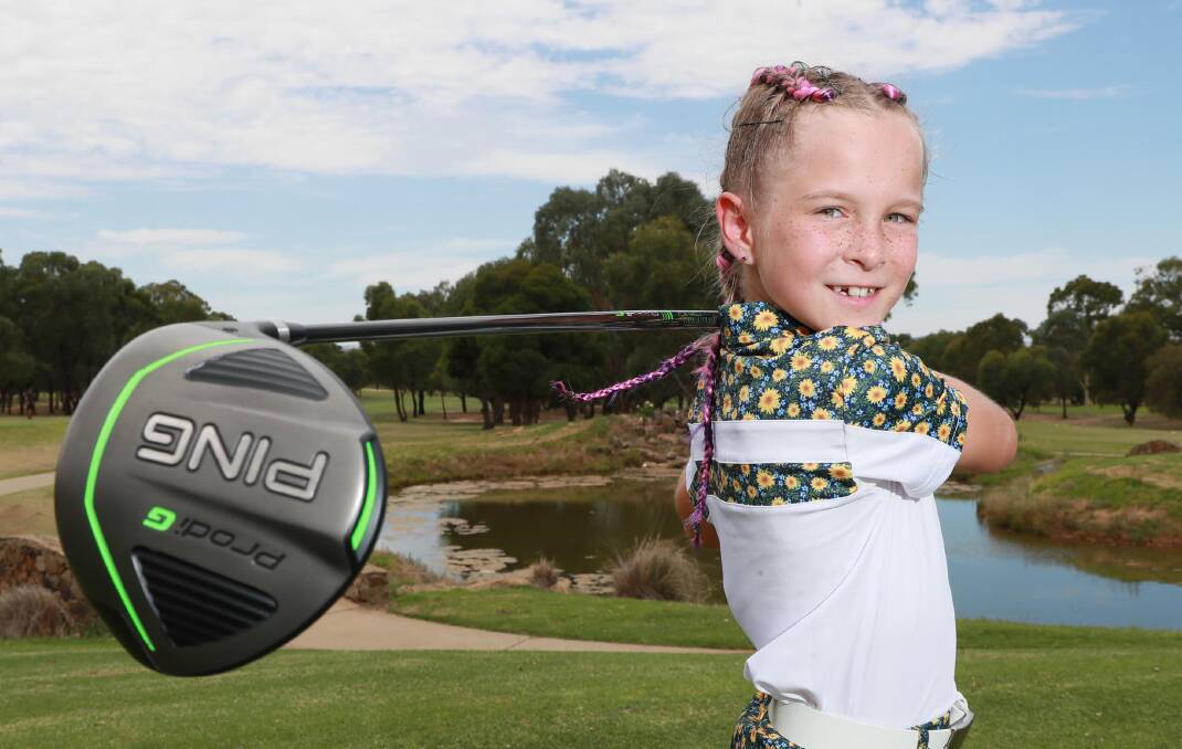 STAR IN MAKING: Nine-year-old Billie Thompson will appear on Seven's new family golf show 'Holey Moley'. Picture: Les Smith