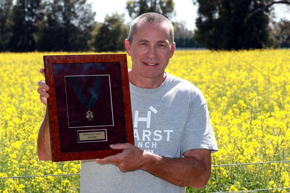 MEDAL MILESTONE: Paul Kelly with the 1995 Brownlow medal at his Wagga property on Wednesday. Picture: Les Smith