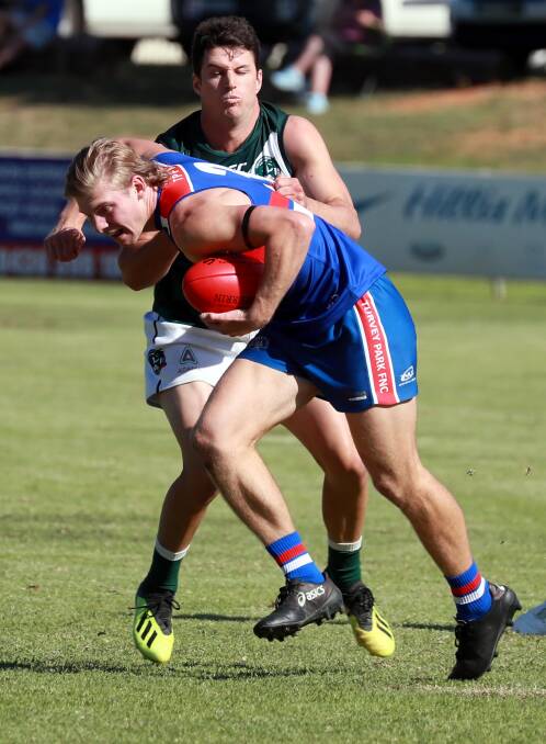 STANDOUT: Coolamon's Jake Barrett tackles Turvey Park's Jack Haggar. Picture: Les Smith