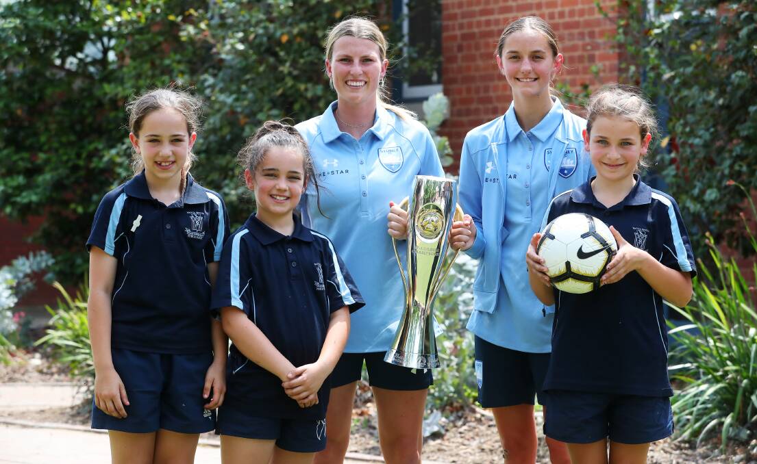 VISIT: Wagga PS students Jasmine Almator, Aleah Almator and Chloe Anderson, with Sydney FC's Ally Green and Jessika Nash. Pictures: Emma Hillier