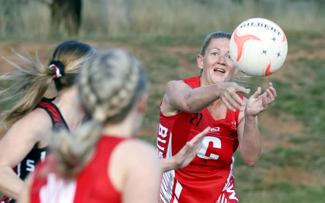 TOUGH LOSS: CSU coach Kirsty Lowe makes a pass during Saturday's defeat to North Wagga. Picture: Les Smith