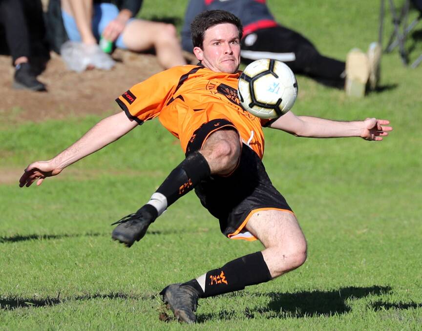 STRONG START: Wagga United's Alec Hope executes a volley during a win over Tolland earlier this year. 