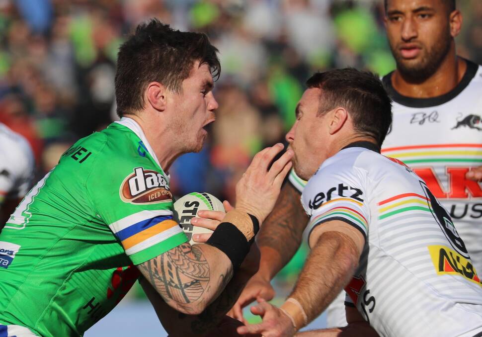 HEAD KNOCK: Raider John Bateman clashes with Penrith's James Maloney during Canberra's 30-12 win at Wagga on Saturday. Picture: Les Smith.