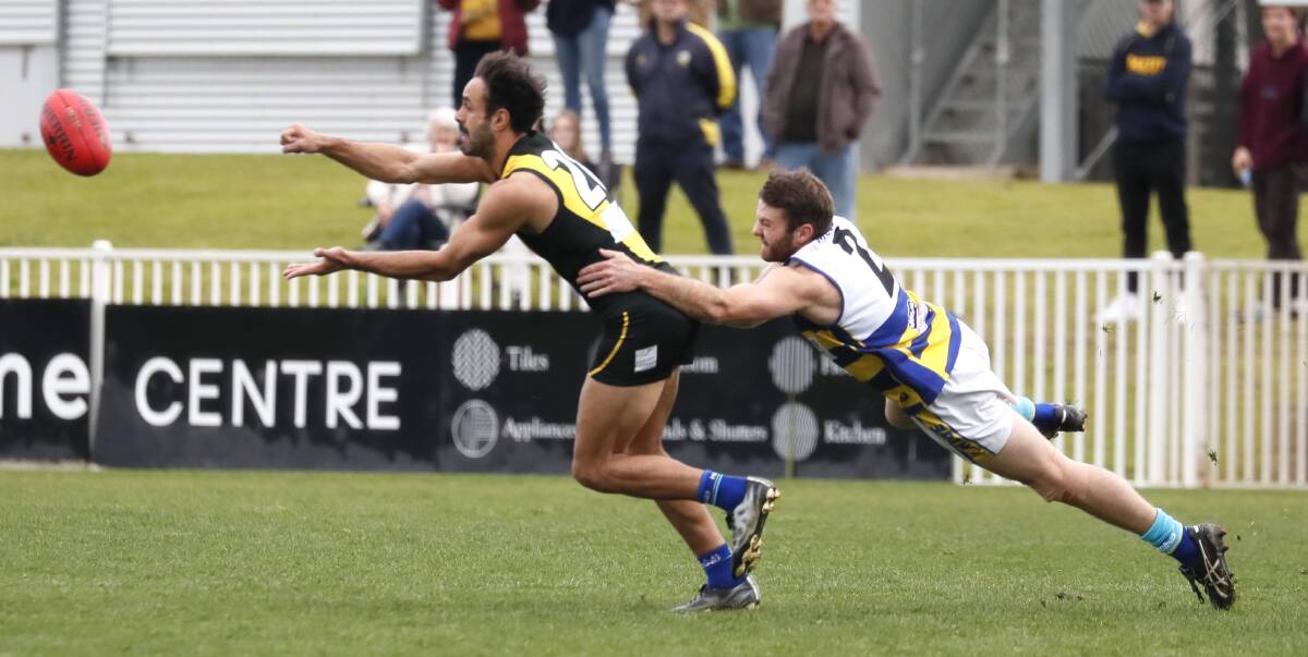 DRAMATIC DAY: Wagga Tiger Jesse Manton is tackled by MCUE's Padric Griffin. Picture: Les Smith