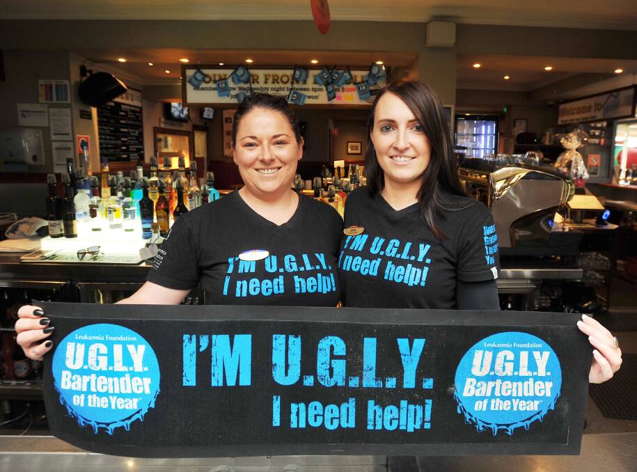 THEY NEED HELP: Farmers Home assistant manager Mia Rosetta and bar attendant Jess Stemp prepare for the U.G.L.Y. Bartender competition. Picture: Kieren L Tilly