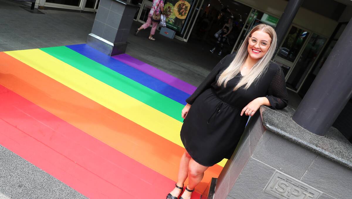 Caitlin Howell at the rainbow crossing at the Marketplace. Picture: Emma Hillier