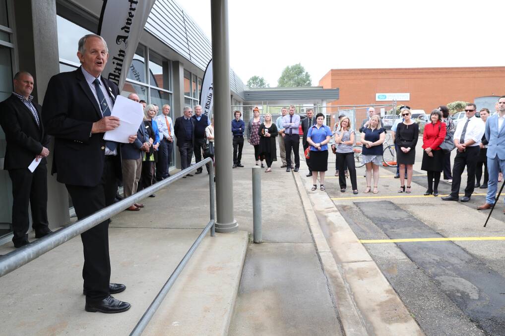 Mayor Greg Conkey helped to open the new The Daily Advertiser office at which location in October last year? Picture: Les Smith