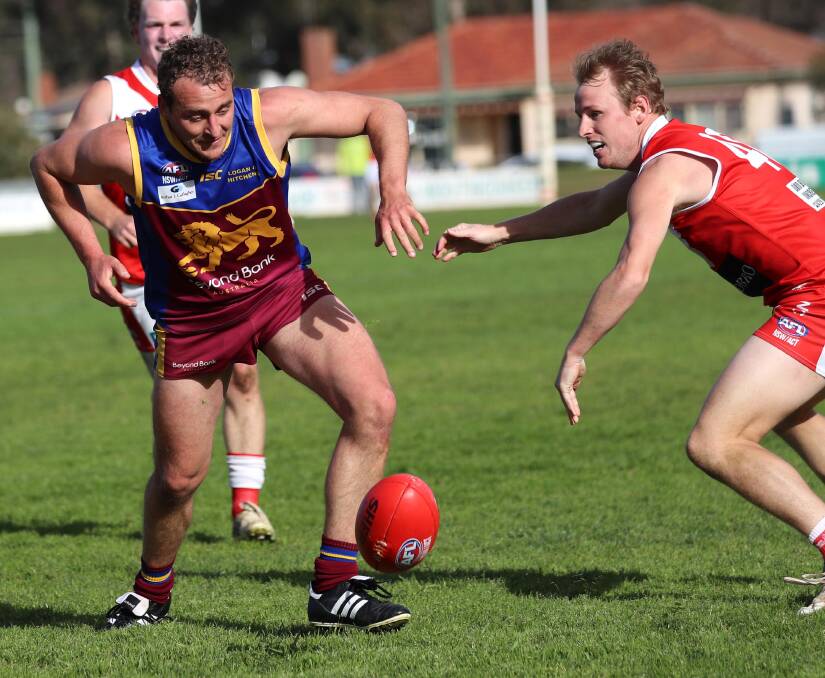 THERE TO BE WON: Ganmain-Grong Grong-Matong's Scott Proctor and Collingullie-Glenfield Park's Ryan Dean look to win the ball at Ganmain Sportsground on Sunday. Picture: Les Smith