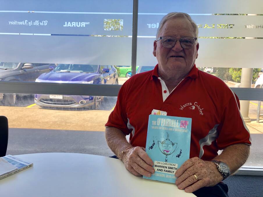 NOT HAPPY: Wagga cricket legend Warren Smith with the book written about the O'Farrell Cup. Picture: Matt Malone