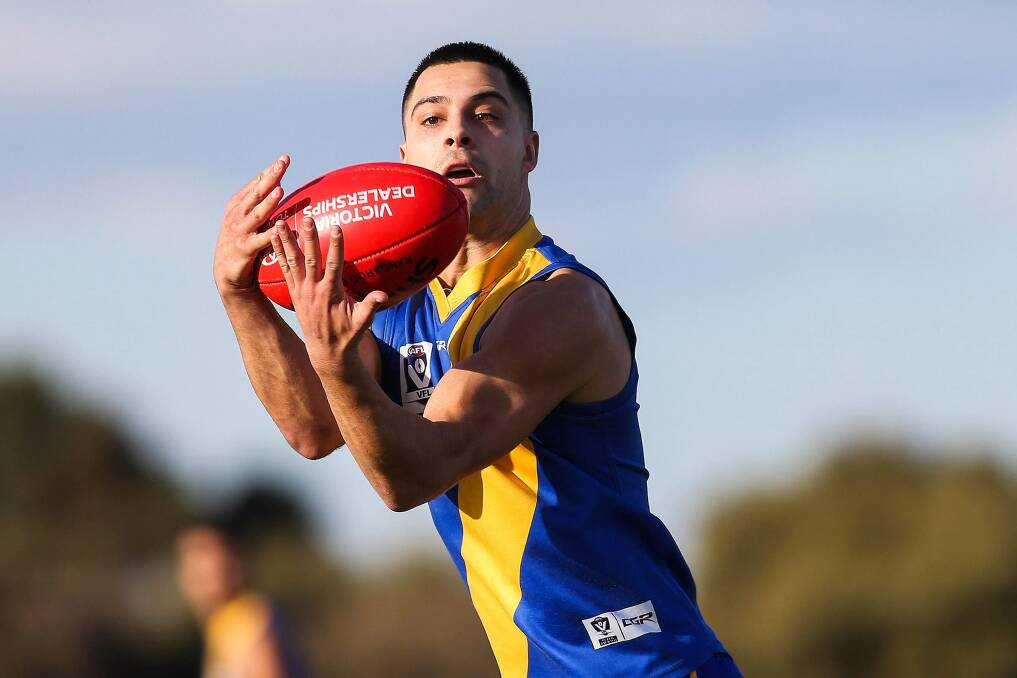 BIG CHANCE: Former Coolamon player Michael Gibbons in action for Williamstown this season. He hopes to be picked up by an AFL club in this week's draft.