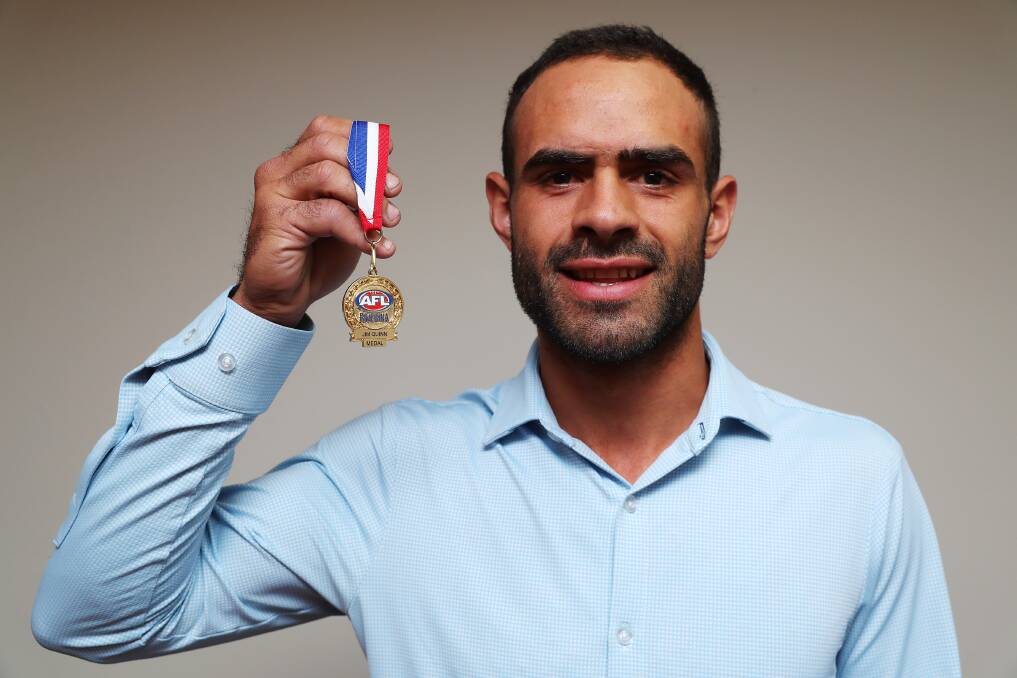 BEST AND FAIREST: Wagga Tigers' Jesse Manton shows off his Jim Quinn Medal that he won at Narrandera Ex-Servicemen's Club on Tuesday night. Picture: Emma Hillier