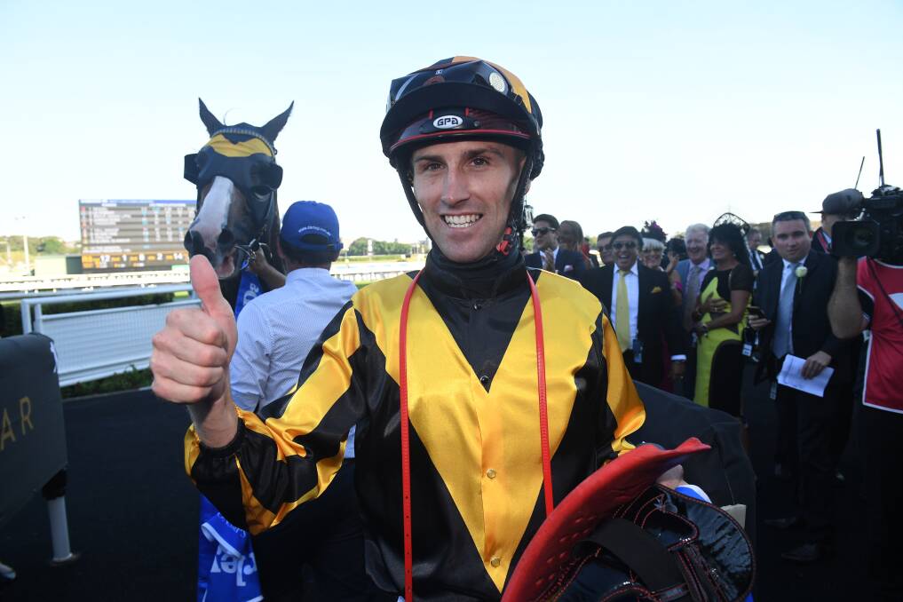 THUMBS UP: Tye Angland is all smiles after guiding Trapeze Artist to victory in the group one All Aged Stakes at Randwick last Saturday. Picture: AAP