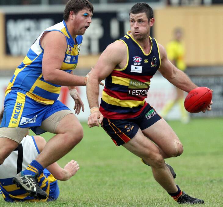 NEW CHAPTER: Neil Irwin in action for Leeton-Whitton in 2015. Irwin has signed with Hume League club Lockhart for this season. Picture: Les Smith