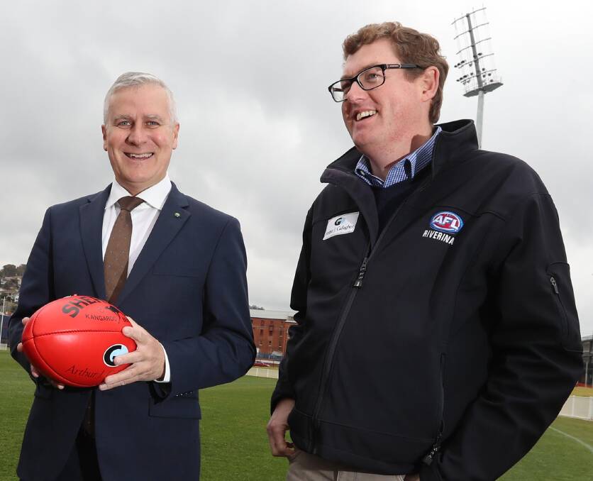 Deputy prime minister Michael McCormack and AFL Riverina chairman Michael Irons
