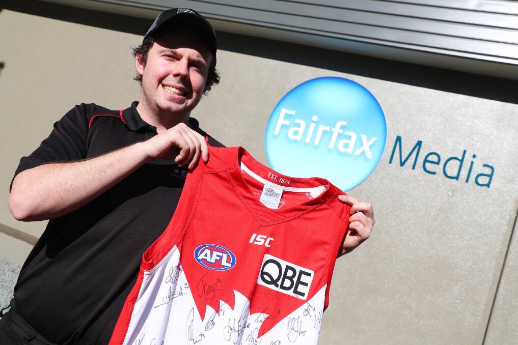 HAPPY DAYS: BSC's Kane McCrea shows off the Swans jumper he won as part of winning The Daily Advertiser's AFL tipping competition. Picture: Emma Hillier