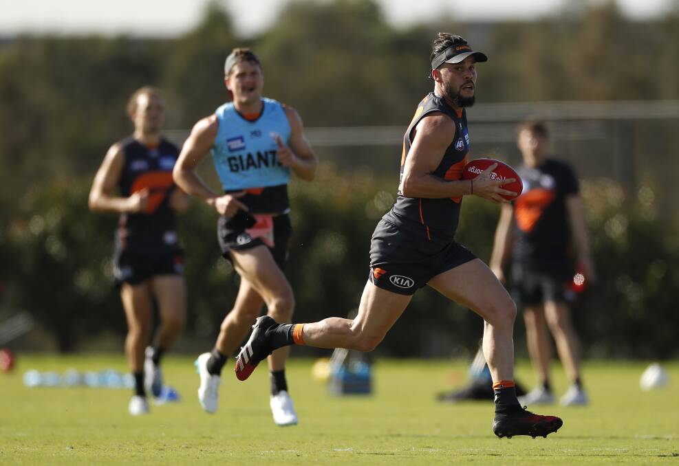 FIT AND FIRING: Zac Williams in full flight at Giants
training last week. Picture: Getty Images