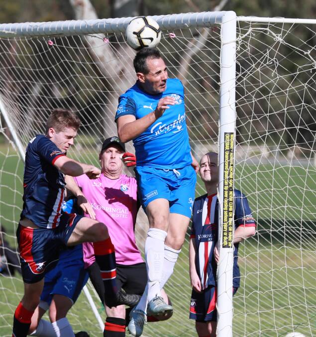 Michael Musitano gets his head to the ball against Henwood Park last Sunday. Picture: Les Smith