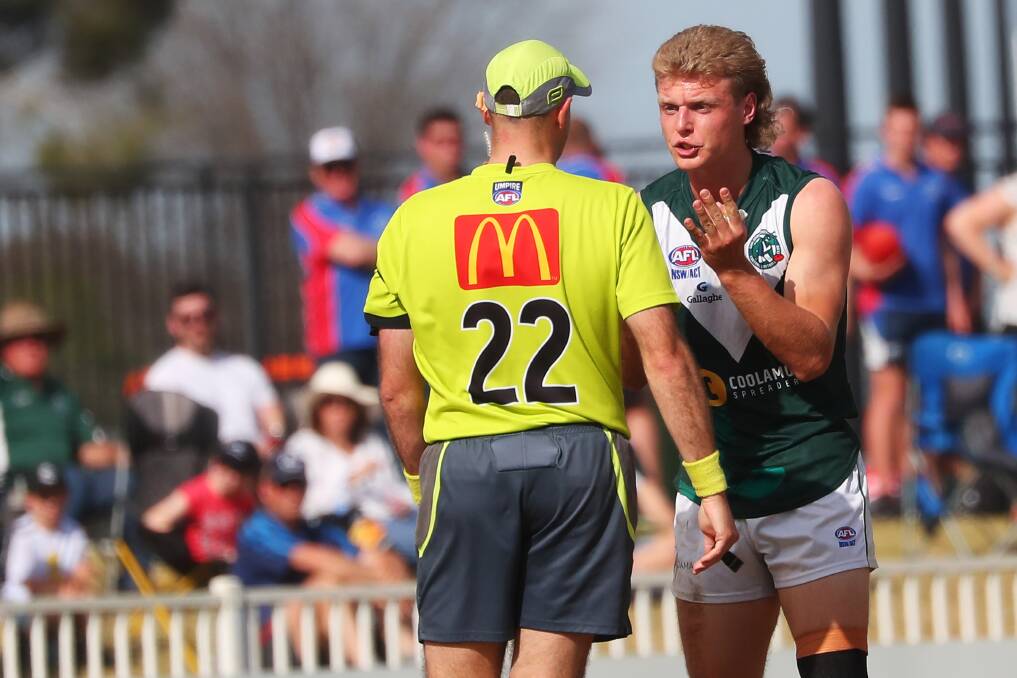 BAD DAY: Coolamon's Jeremiah Maslin complains to an umpire on Sunday about a mark that wasn't paid to him early in the second quarter of the preliminary final against Wagga Tigers at Robertson Oval. Picture: Emma Hillier