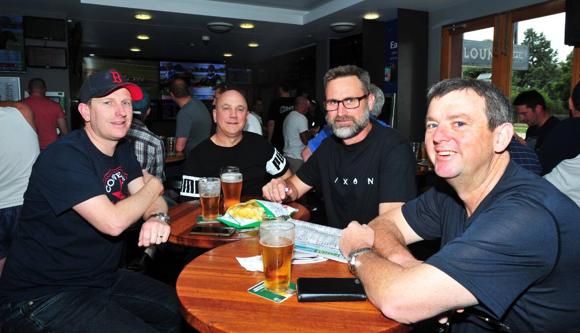 HAPPY DAYS: Jarrod Lindsay, David Comerford, Gavin Hubbard and Chris Flanigan enjoy watching the Kosciuszko at the William Farrer Hotel on Saturday. Picture: Chelsea Sutton 