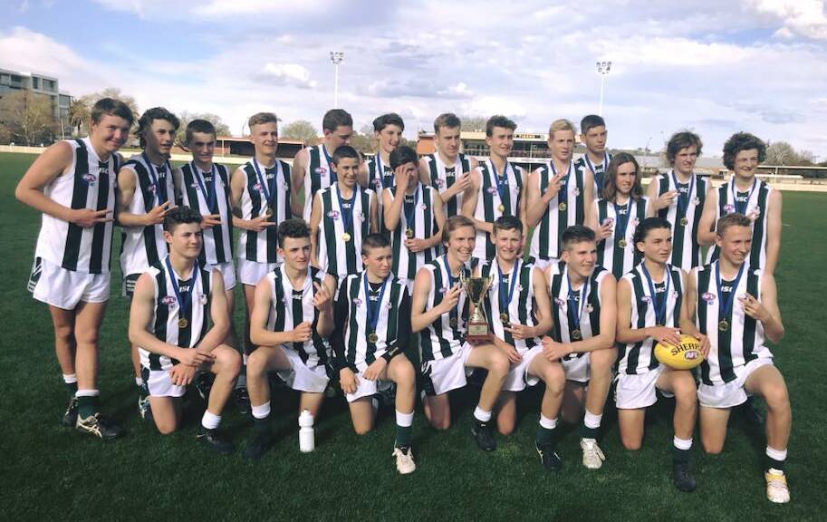 CHAMPIONS: The Riverina Anglican College (TRAC) celebrate their under 15 state title in Albury on Tuesday.