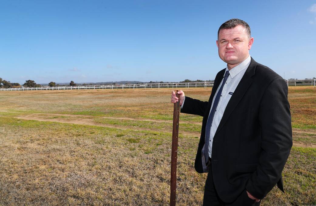 EXCITING TIMES: Murrumbidgee Turf Club chief executive Scott Sanbrook looks over land the club hopes to use for a new stabling facility. Picture: Emma Hillier