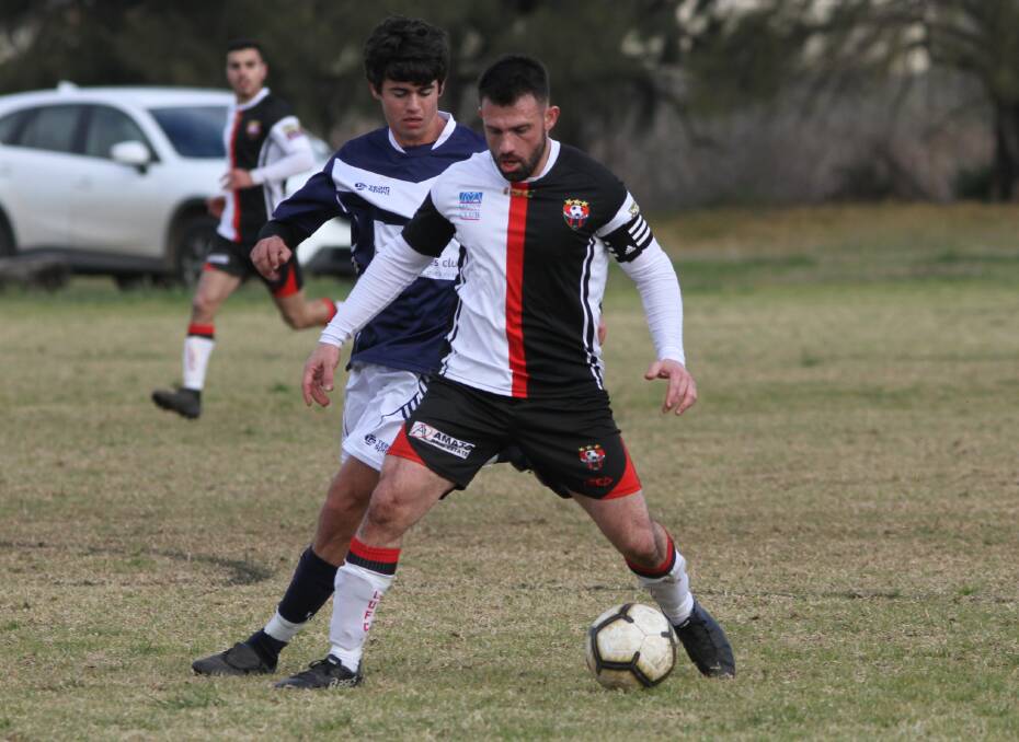 BIG MOMENT: Leeton United co-captain Joey Fondacaro
in action against Young. Picture: Talia Pattison