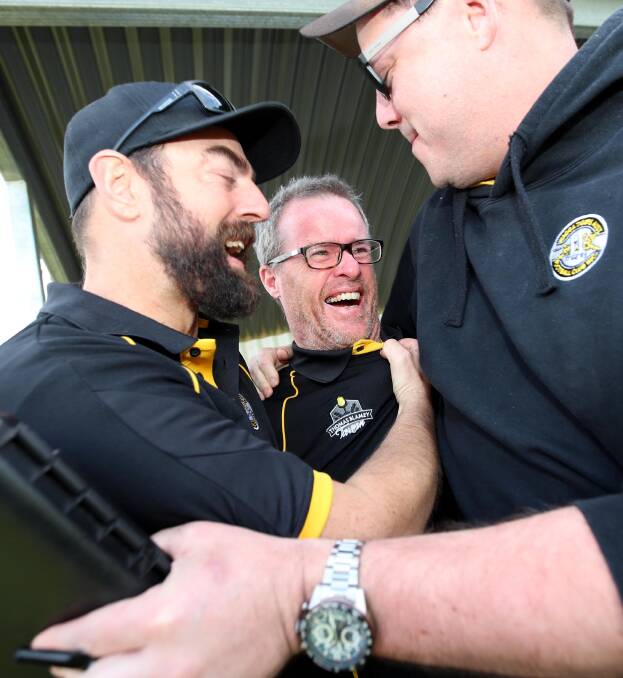 GOING AGAIN: Wagga Tigers coach Troy Maiden celebrates the club's premiership win after the siren sounds in last month's grand final. Maiden has re-signed for a second year in charge. Picture: Les Smith