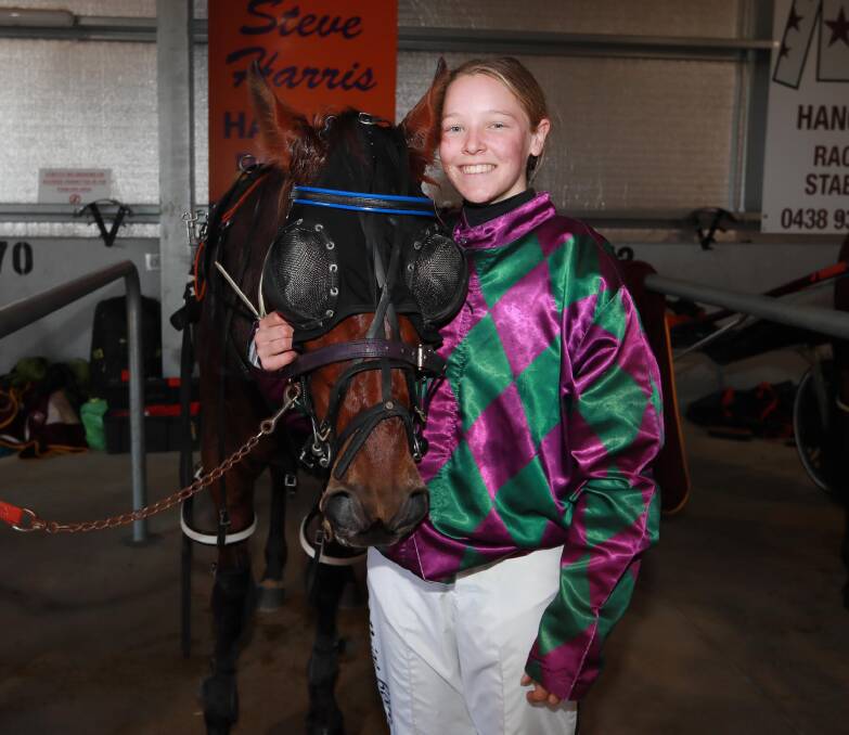 GOING GREAT GUNS: Wagga reinswoman Paige Bevan with Machs Legacy after their win at Riverina Paceway on Friday. Picture: Les Smith