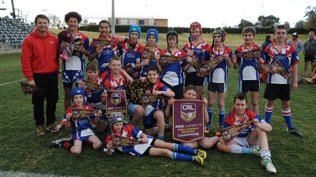 CHAMPIONS: Tumut's McAuley Central School celebrate their victory in the under 13 Small Schools Final at Dubbo on Wednesday. Picture: Belinda Soole