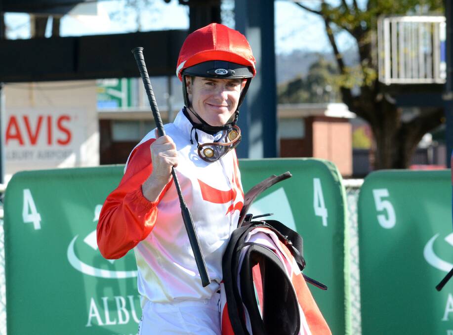 I'M BACK: John Kissick is all smiles after enjoying his first winner since his return to the saddle on Waiting For A Mate at Albury on Monday. Picture: Kylie Shaw - Trackpix