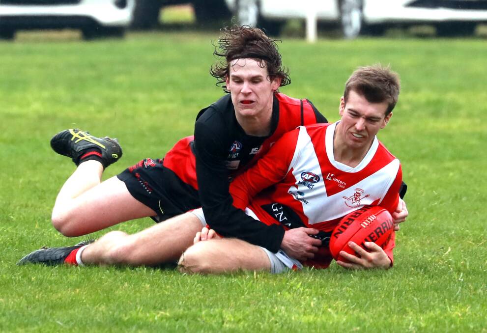Collingullie-Glenfield Park's Harrison Hugler is tackled by Marrar's Toby Lawler at Langtry Oval on Saturday.