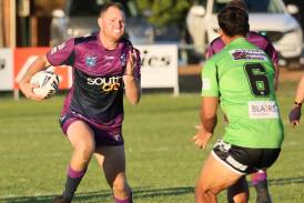Southcity forward Tim Hurst makes a charging run in the Bulls' loss to Albury at Harris Park on Saturday night. Picture by Les Smith