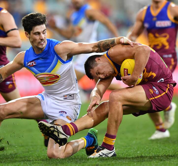 Jake Barrett in action for the Lions against Gold Coast last year.