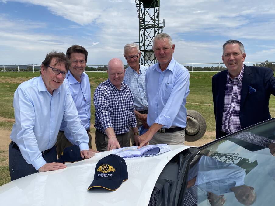 OPPORTUNITY: Member for Wagga Dr Joe McGirr and NSW racing minster Kevin Anderson look over plans for a new stable complex with Murrumbidgee Turf Club representatives Jason Ferrario, Bruce Harris, Geoff Harrison and Brett Bradley. 