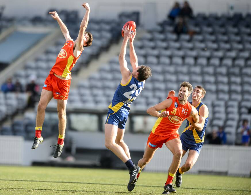 Ben Halse takes a mark during a NEAFL game against Gold Coast Suns in 2017. Picture: Sitthixay Ditthavong