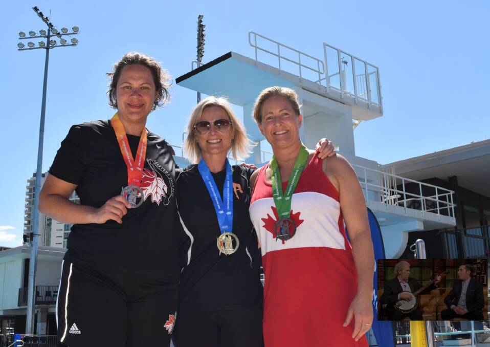 Former Wagga diver Kate Henderson (middle) shows off her gold medal at the Pan Pacific Masters Games at the Gold Coast, flanked by her Canadian opponents that won silver and bronze.