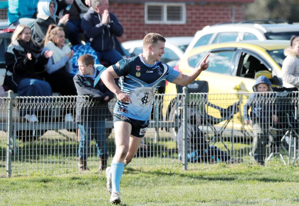 DAY OUT: Tumut backrower Ben Roddy celebrates one of his three tries against Kangaroos last Saturday, in what was his 100th game for the Blues. Picture: Kieren L Tilly