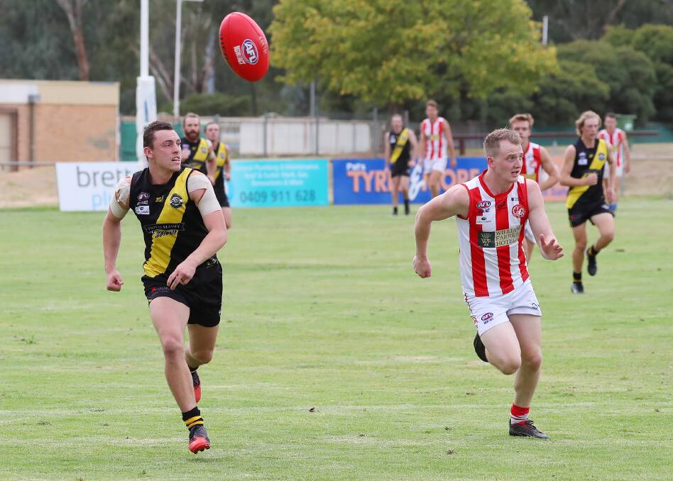 SHORT STINT: Nick Keegan (left) in action for Wagga Tigers during a pre-season game. Keegan has been cleared from the club. 